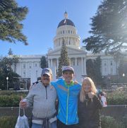 riley cook after the california international marathon with his parents