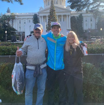 riley cook after the california international marathon with his parents