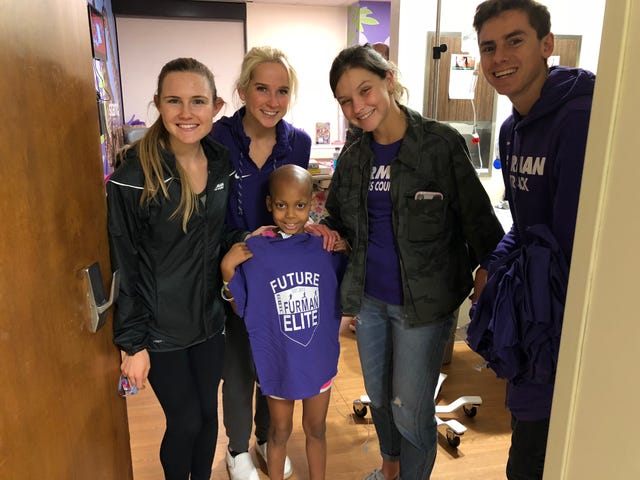 Furman cross country visits hospital