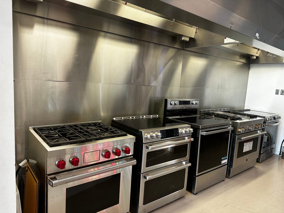 a lab kitchen with stainless steel ranges