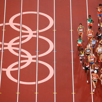 tokyo, japan   july 30 competitors in heat 1 of the womens 5000m round 1 run past the olympic rings on day seven of the tokyo 2020 olympic games at olympic stadium on july 30, 2021 in tokyo, japan photo by richard heathcotegetty images