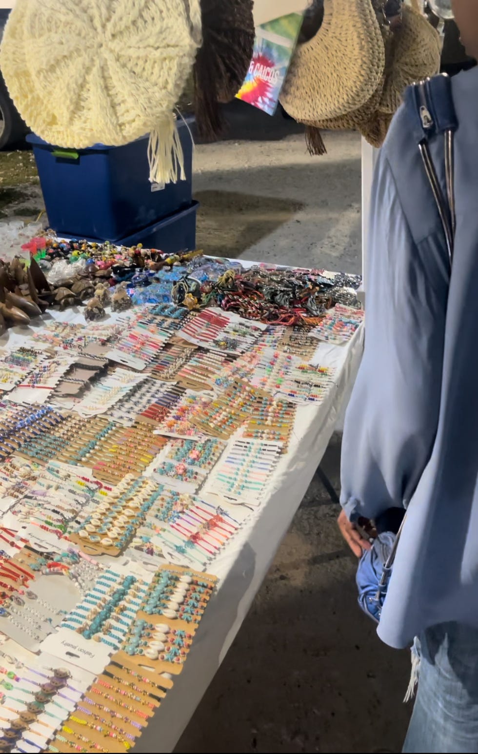 A person standing next to a table with a map on it