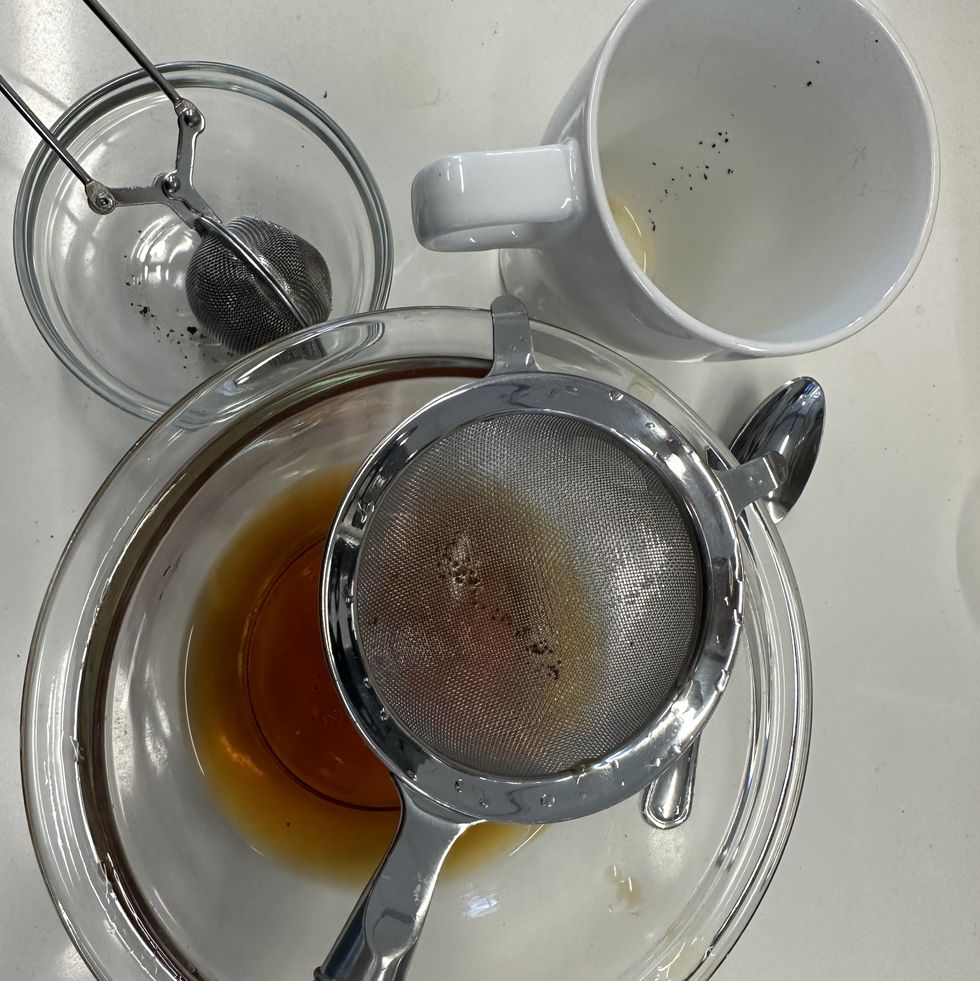 a closeup of sediment remaining in a cup of tea