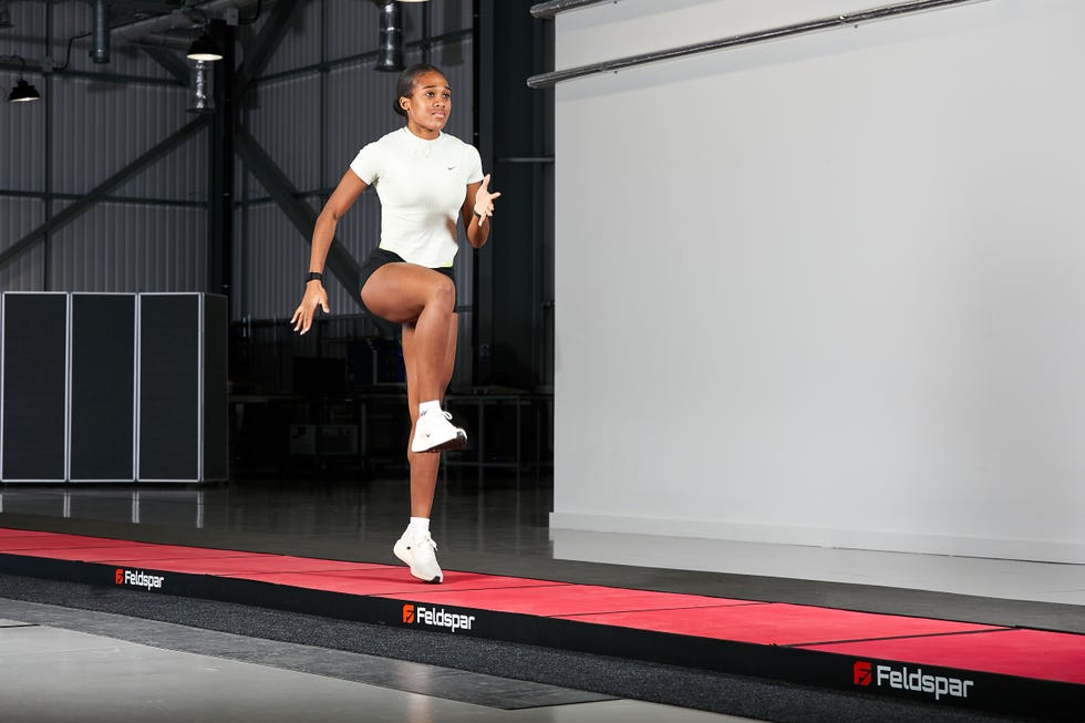athlete doing drills on a prototype running track