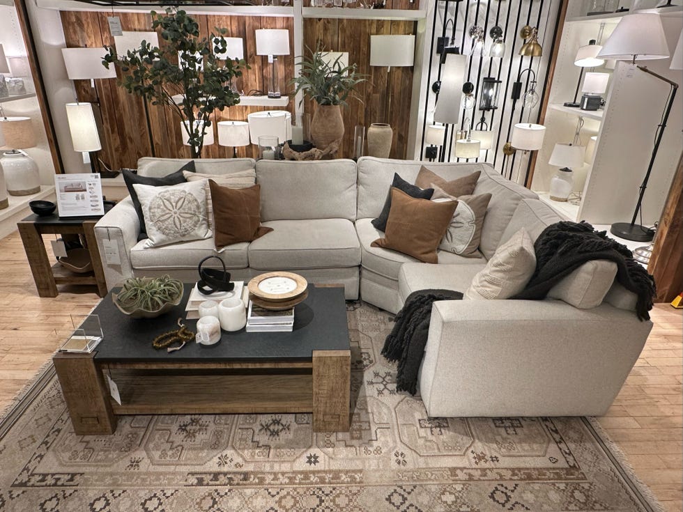 an image of a sofa in a showroom at pottery barn