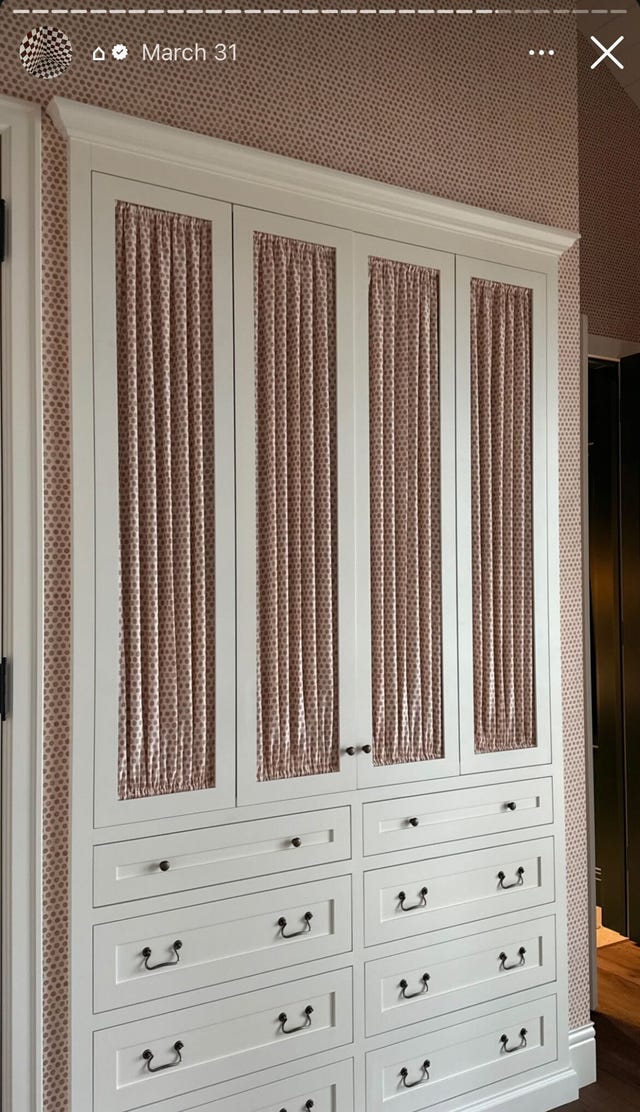 inset wardrobe with curtained doors