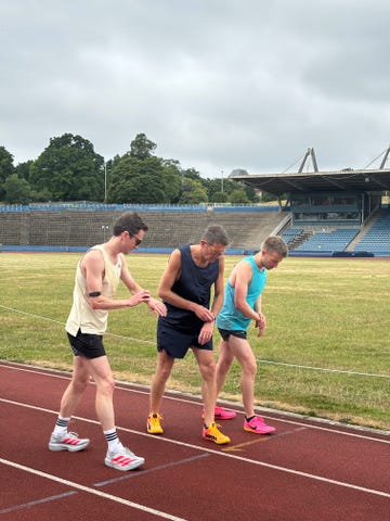 three athletes about to run a mile