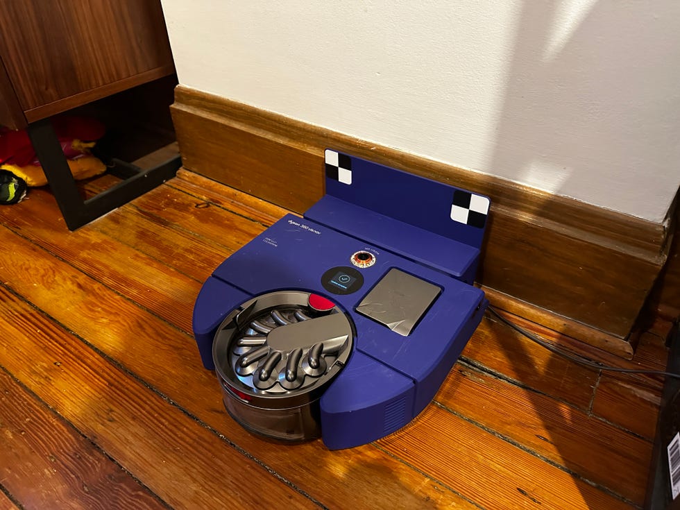 the dyson 360 vis nav on its charging base
