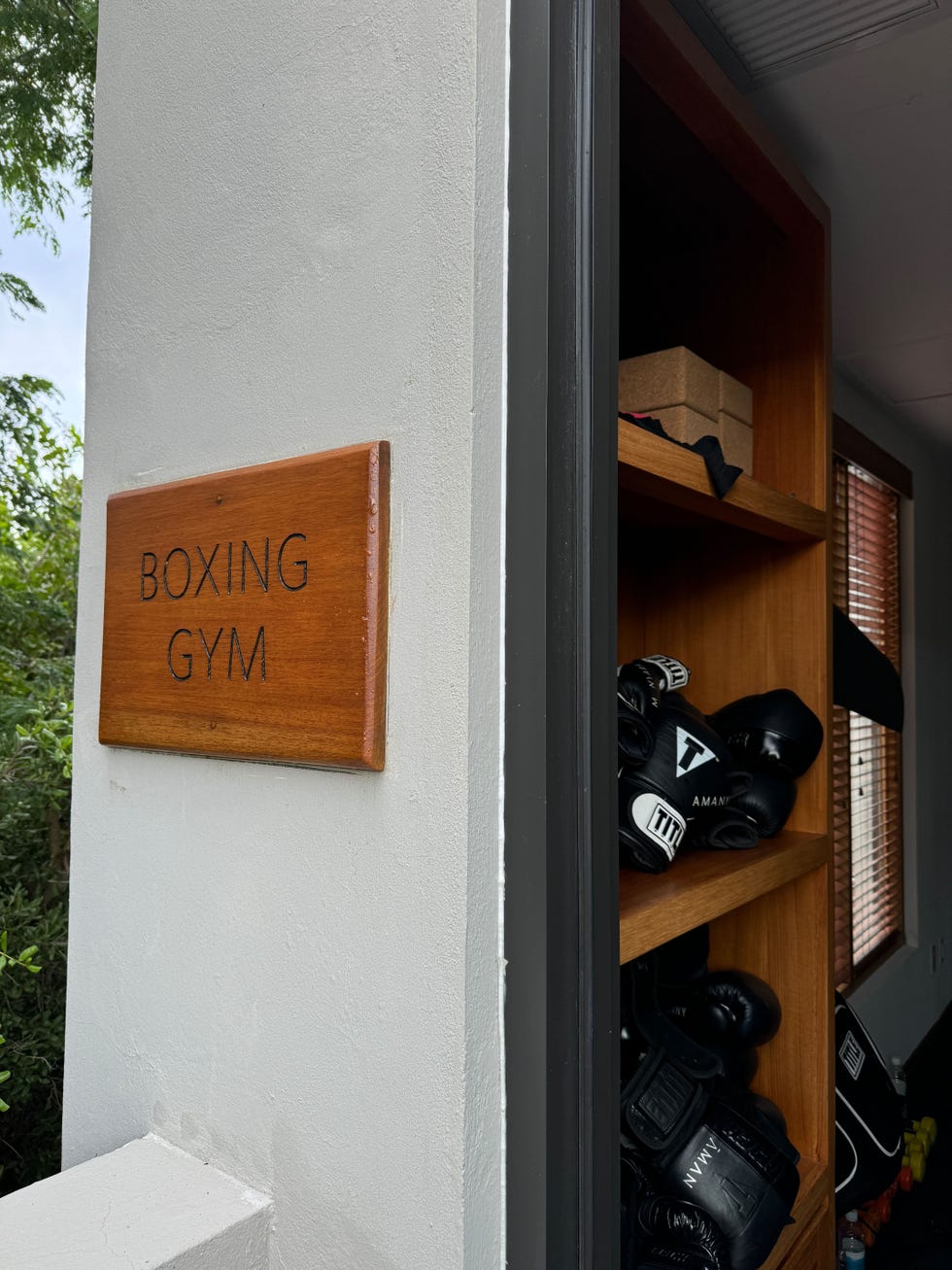 sign indicating the entrance to a boxing gym