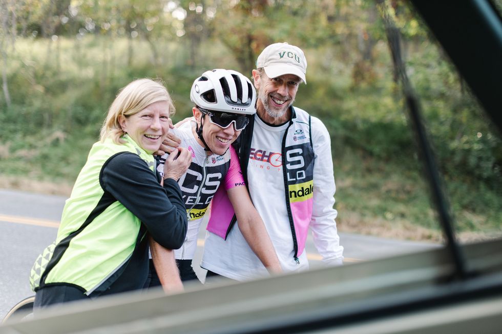 sean gardner with his parents after his everesting record ride