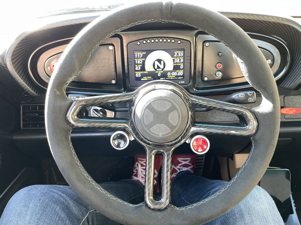 car steering wheel and dashboard
