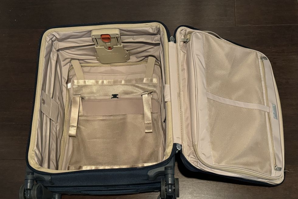 a view of the interior of briggs and riley baseline carry on luggage
