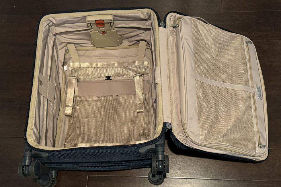 a view of the interior of briggs and riley baseline carry on luggage