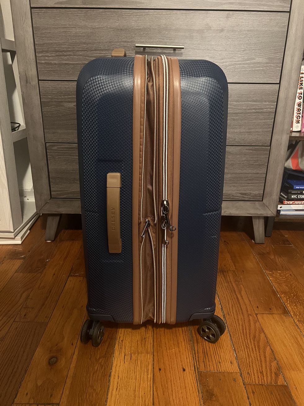 a suitcase on a wooden floor