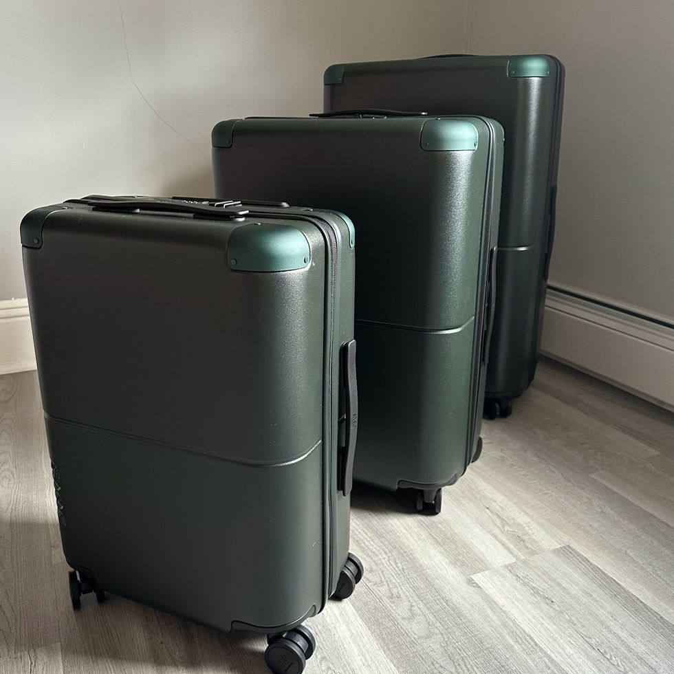a couple of suitcases on a hardwood floor