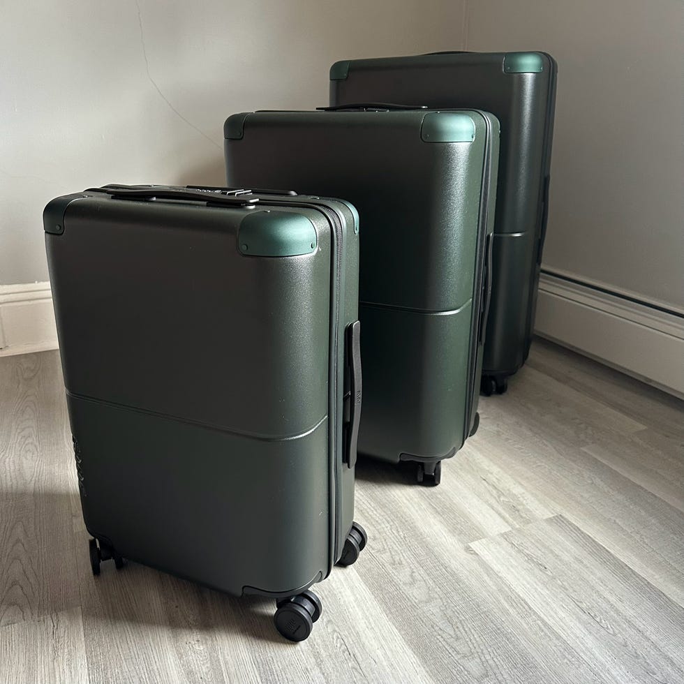 a couple of suitcases on a hardwood floor