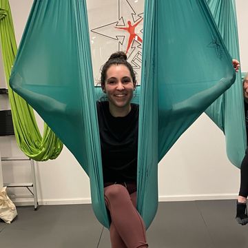 lindsay gellar at an aerial yoga class