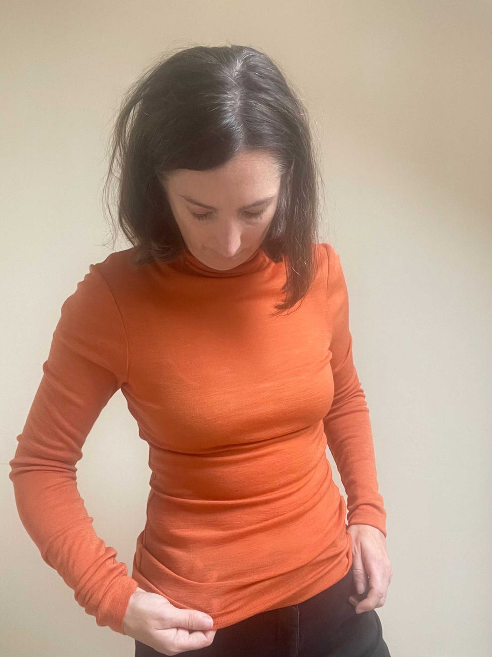 claudia winkleman traitors polo neck