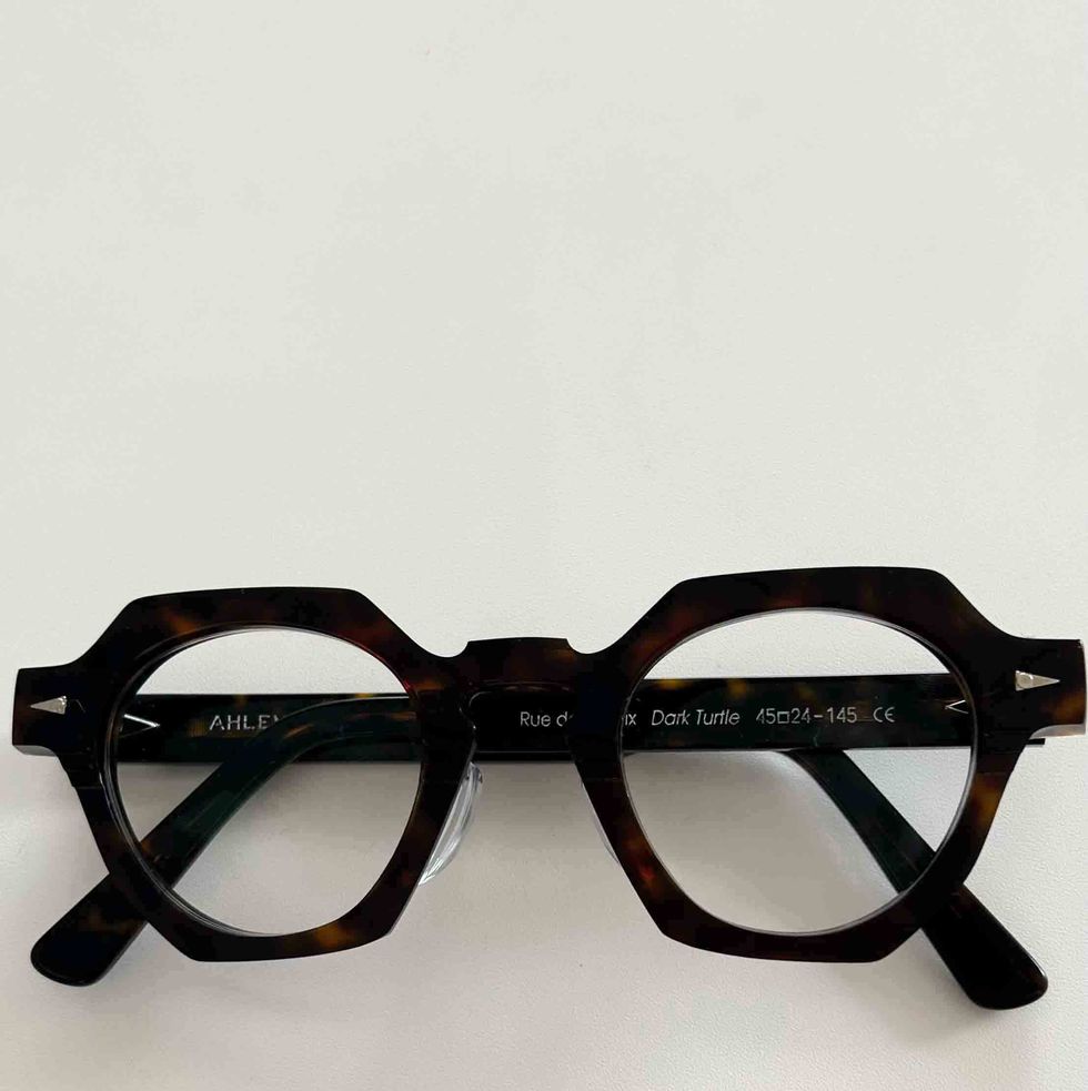 a pair of black framed glasses