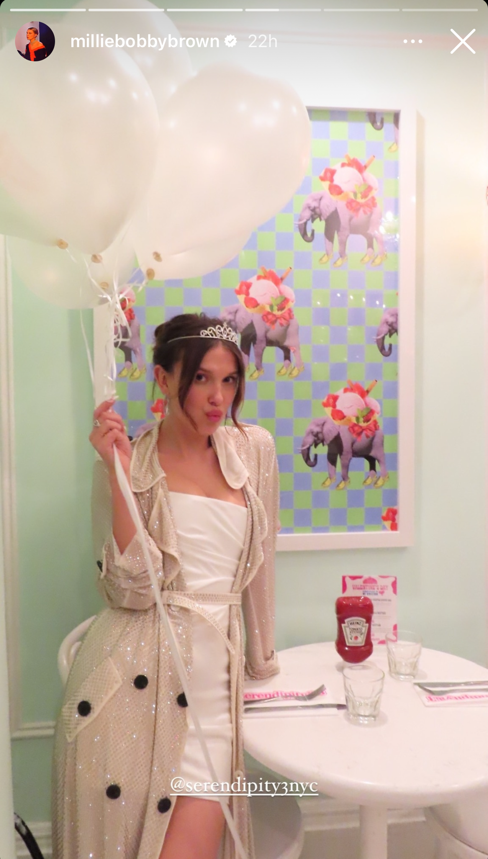 millie bobby brown celebrating her birthday in a white minidress