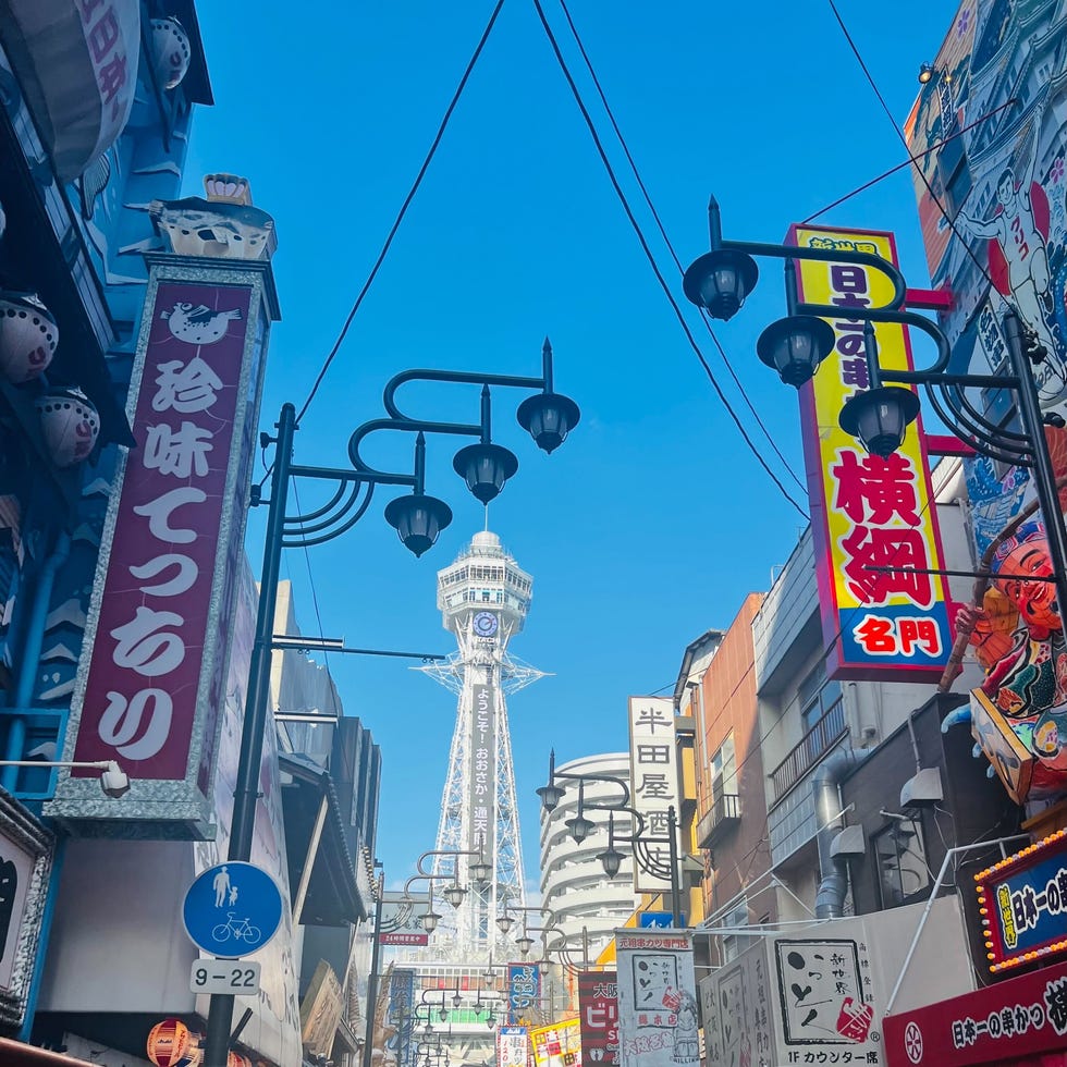 a city street with many signs