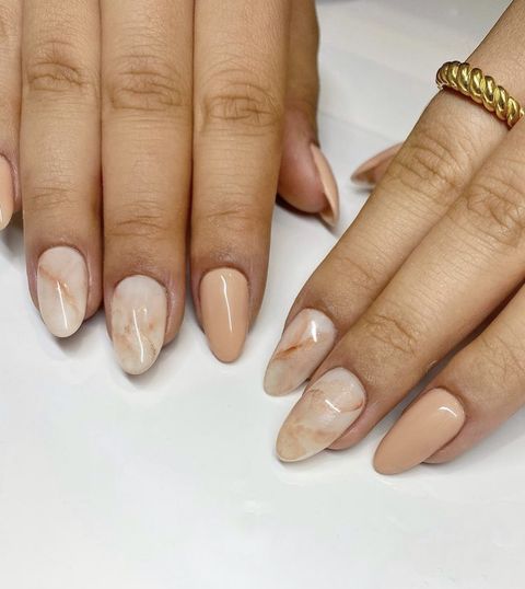 nude and rose gold marble nails