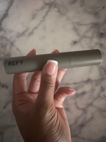 a hand holding refy lash sculpt tube