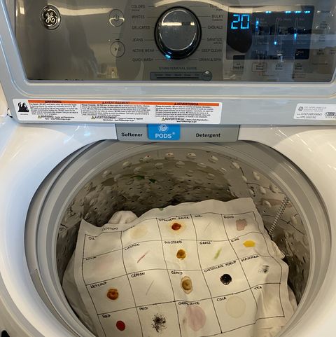 stained fabric swatch in a washing machine