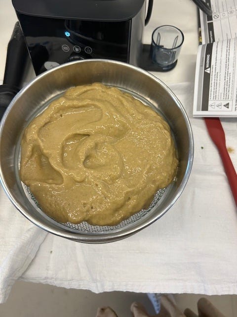 smoothie results inside of fine mesh sieve
