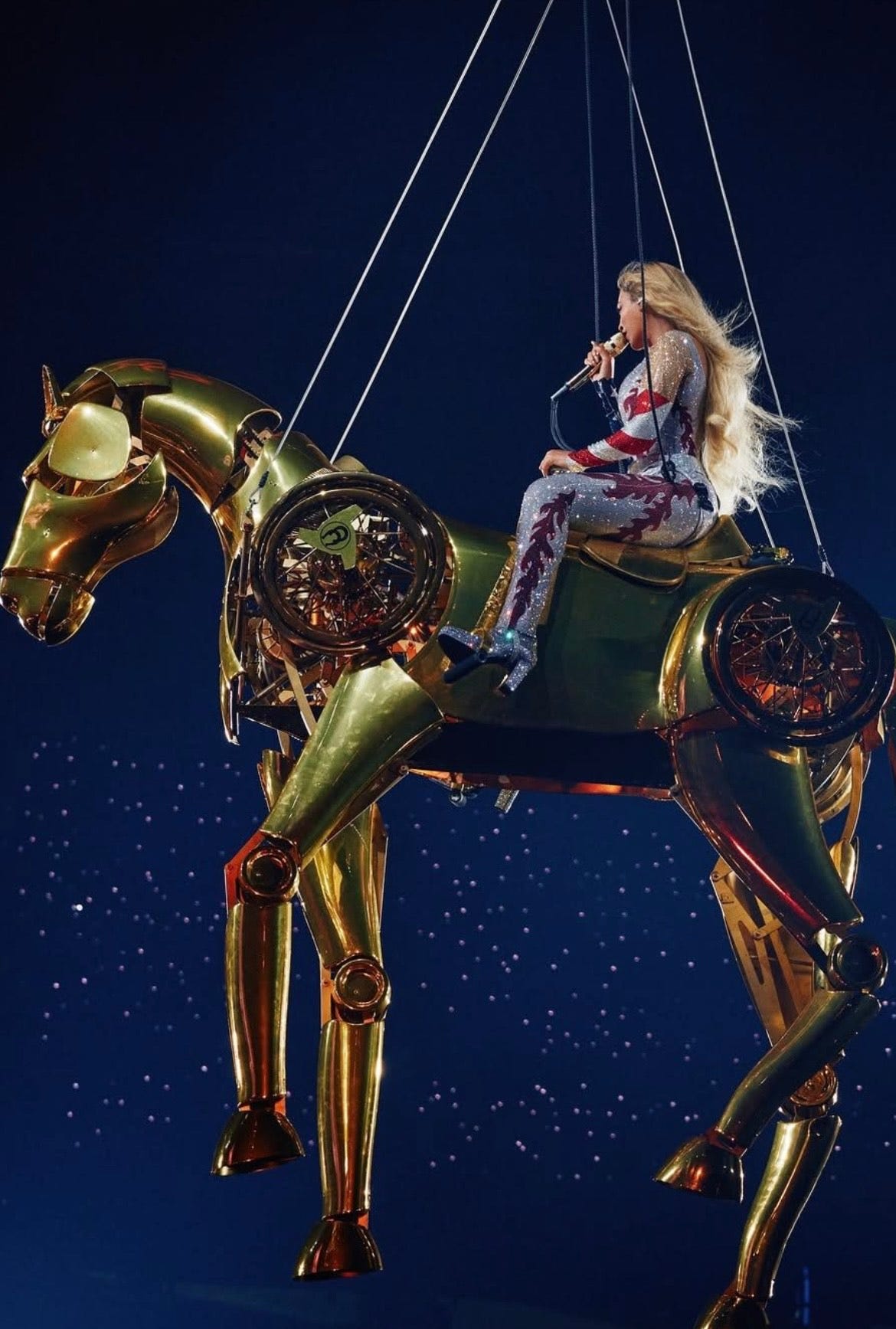 Beyoncé Gallops Through the Air on a Golden Horse Following Suspended Car Malfunction