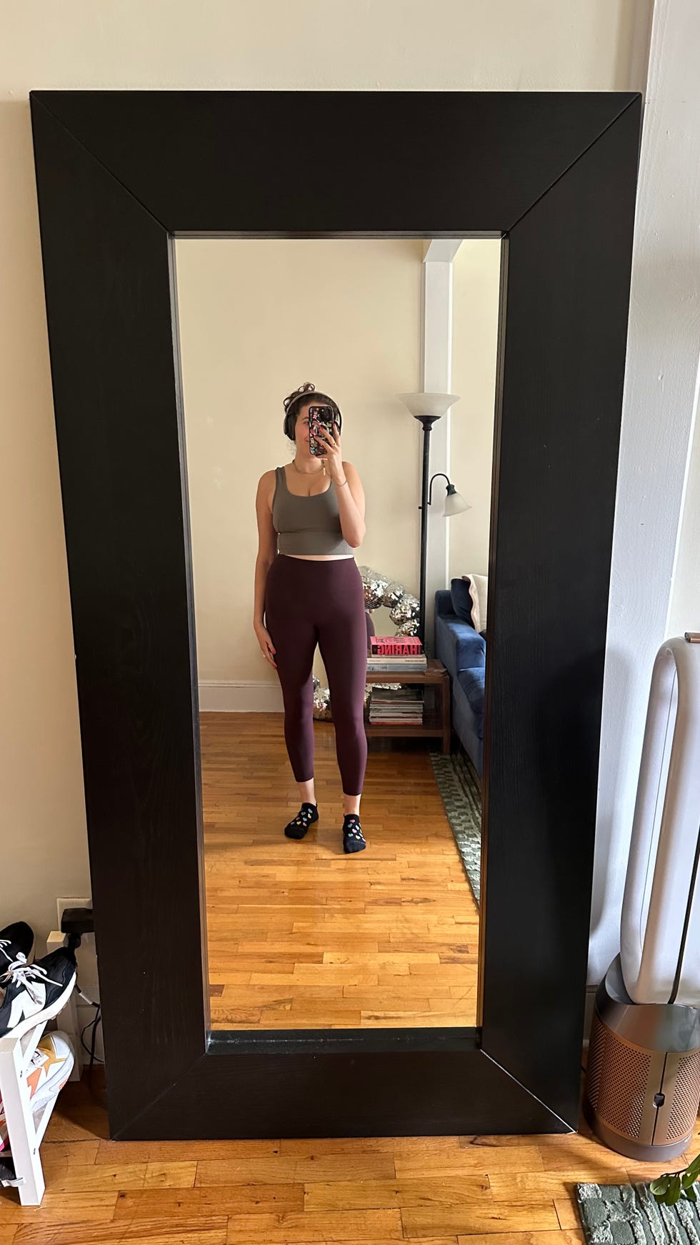 a tester wearing purple lululemon no line align leggings with grip socks, good housekeeping's review