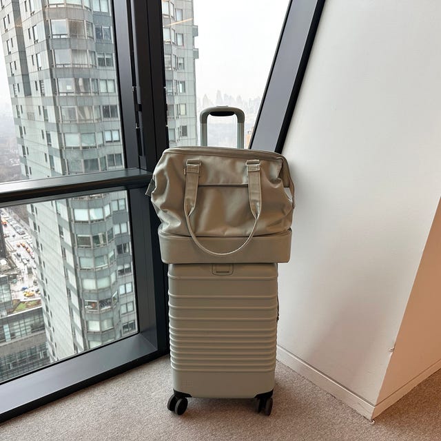 a photo of the beis carry on luggage and beis weekender bag