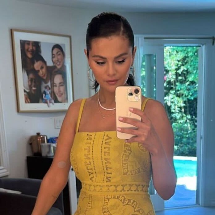 Selena Gomez Wears Yellow Dress With Kate Spade Lemon Bag