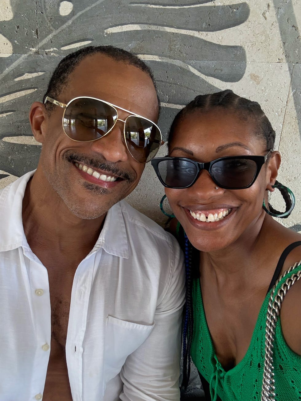 the author and her husband smiling at the camera