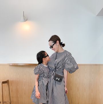 two women in dresses