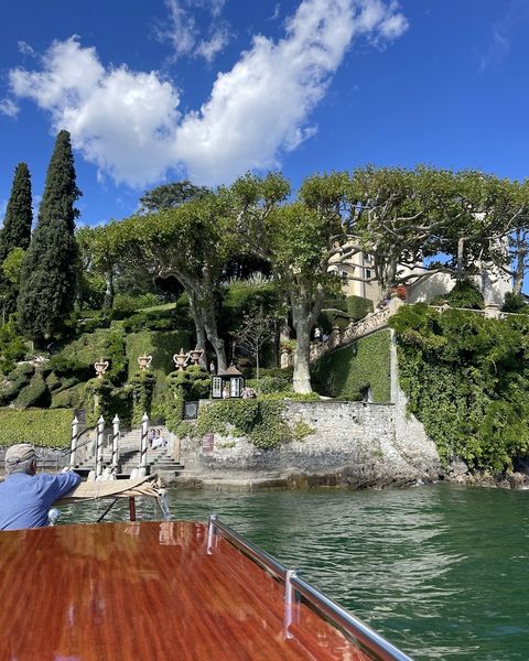 view from boat of house on cliff