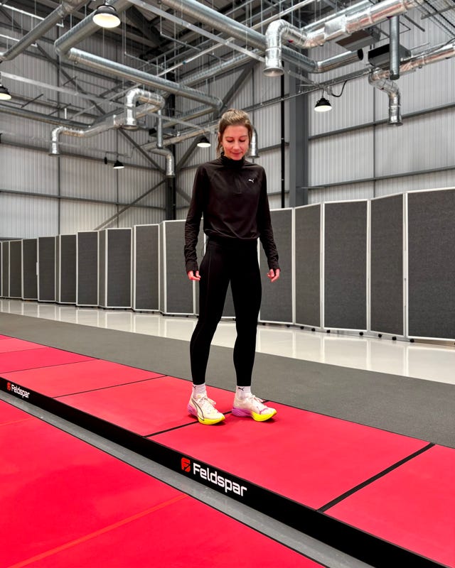athlete practicing on training mat