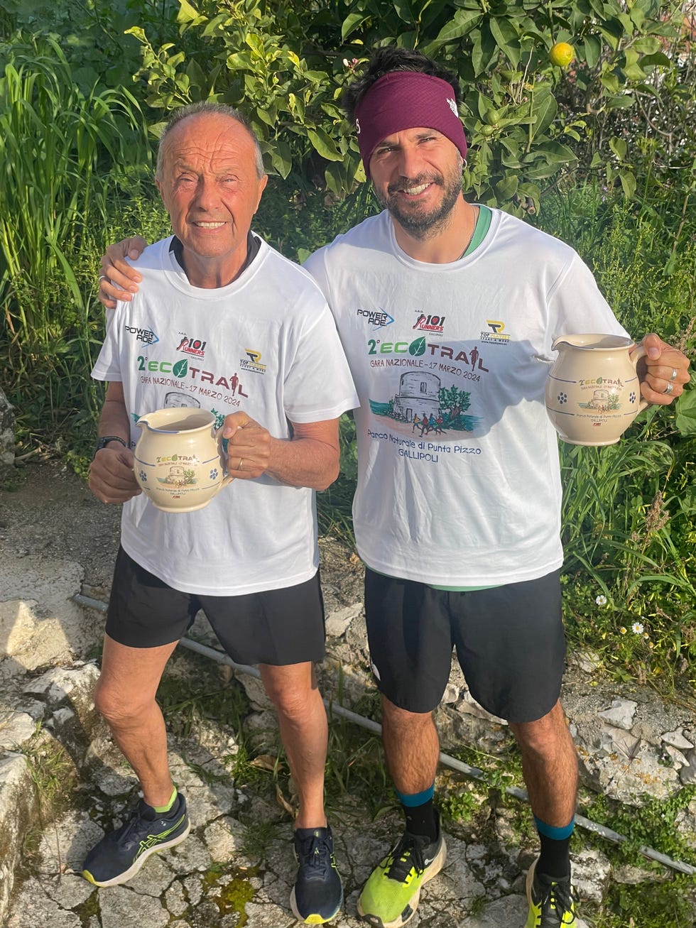 a couple of men holding mugs