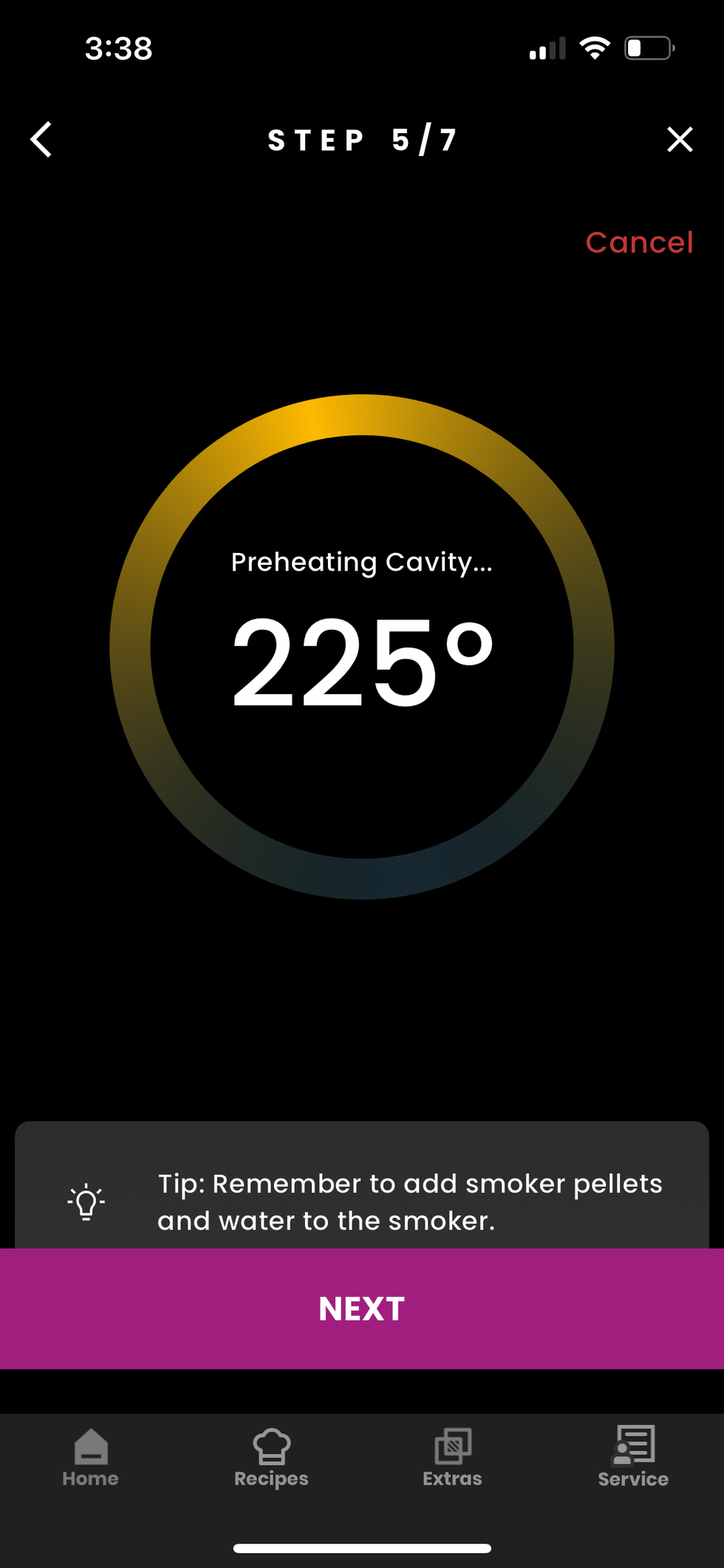 display showing preheating information for a smoker with a temperature reading