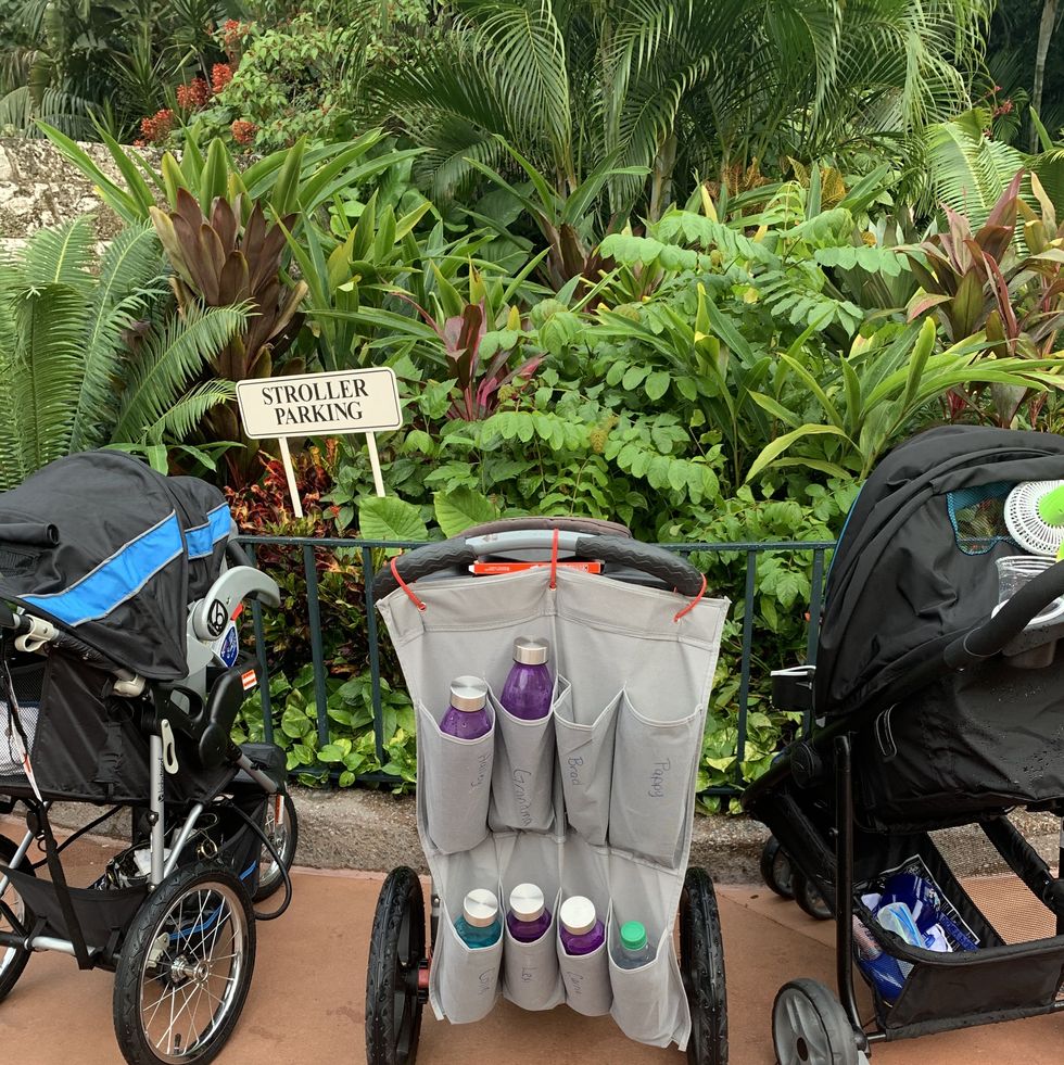 a baby stroller with a sign
