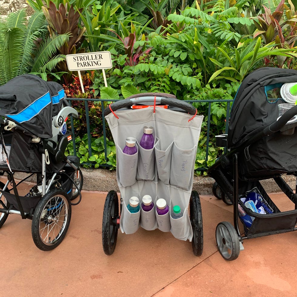 stroller parking at disney world a baby stroller with a sign