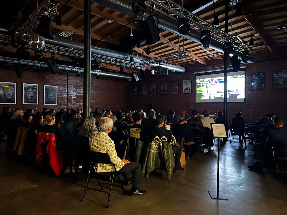 a group of people watching a film