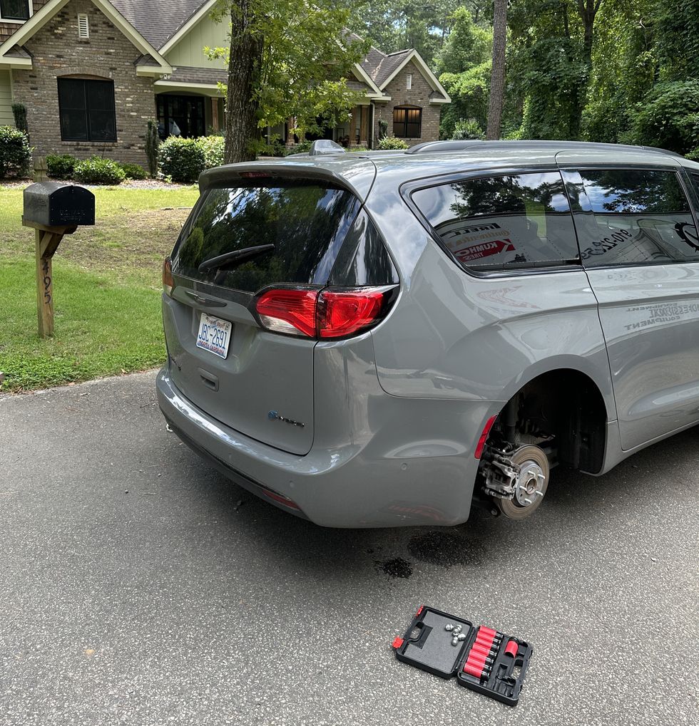 chrysler pacifica getting tire changed