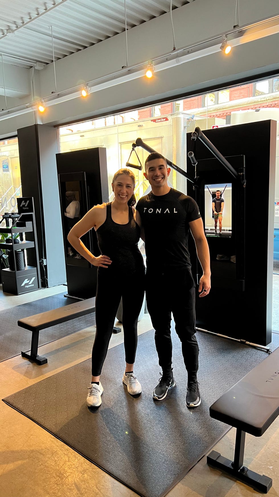 doing a workout with tonal instructor tim landicho