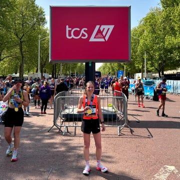 participants celebrating at the tcs marathon finish area