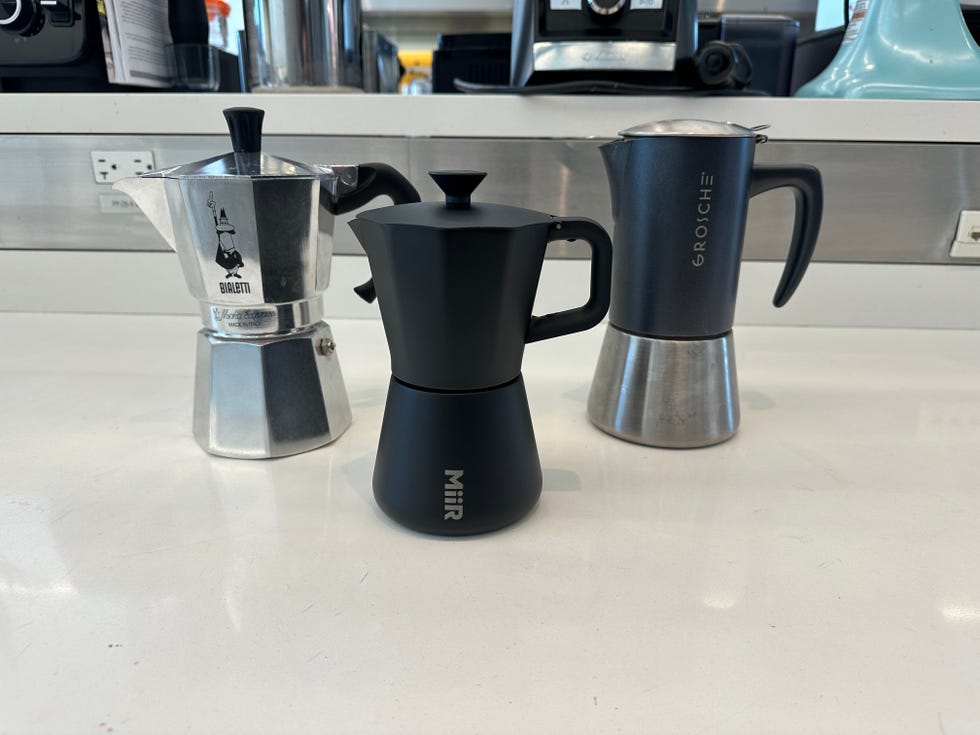 three moka pots on the lab countertop