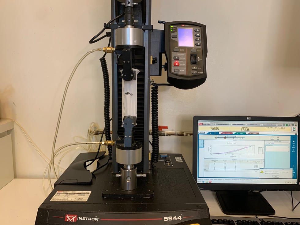 an instron machine testing sheet fabric strength in the good housekeeping institute textiles lab