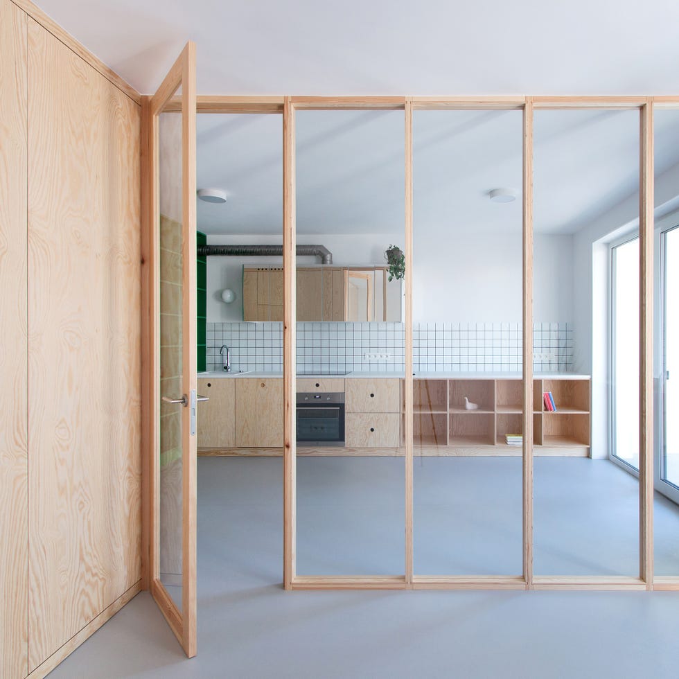 un apartamento de 40 m2 con cerramiento de cristal