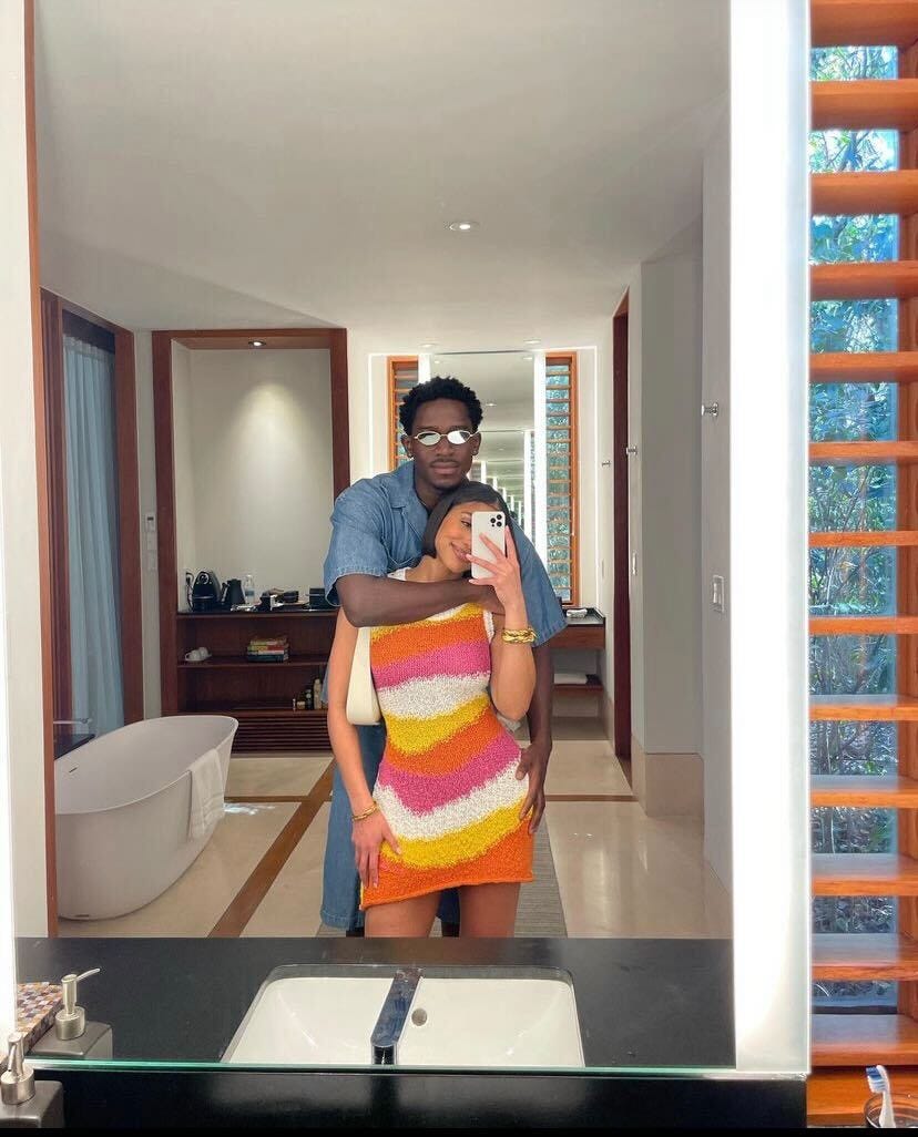 Lori Harvey Makes a Splash in a Plunging Swimsuit and Cowboy Hat