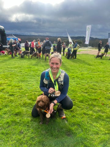 sophie raworth and her dog luna with medals